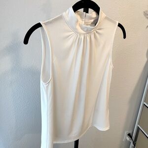 H&M formal top. Sleeveless top. Brand new